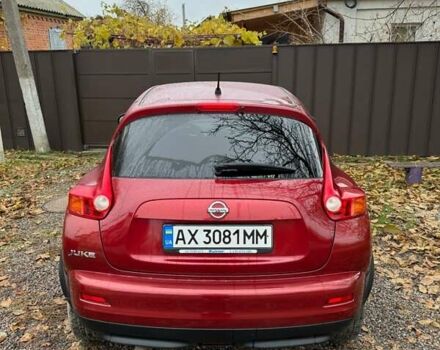 Червоний Ніссан Жук, об'ємом двигуна 1.6 л та пробігом 211 тис. км за 10500 $, фото 4 на Automoto.ua
