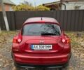 Червоний Ніссан Жук, об'ємом двигуна 1.6 л та пробігом 211 тис. км за 10500 $, фото 4 на Automoto.ua
