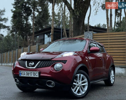 Червоний Ніссан Жук, об'ємом двигуна 1.6 л та пробігом 97 тис. км за 10750 $, фото 2 на Automoto.ua
