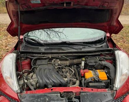 Червоний Ніссан Жук, об'ємом двигуна 1.6 л та пробігом 211 тис. км за 10500 $, фото 9 на Automoto.ua