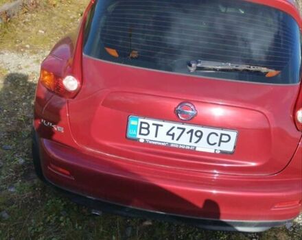 Червоний Ніссан Жук, об'ємом двигуна 1.6 л та пробігом 159 тис. км за 8900 $, фото 4 на Automoto.ua