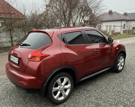 Красный Ниссан Жук, объемом двигателя 1.6 л и пробегом 93 тыс. км за 11000 $, фото 4 на Automoto.ua