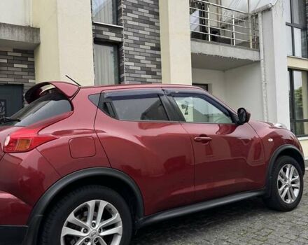 Красный Ниссан Жук, объемом двигателя 1.6 л и пробегом 92 тыс. км за 11500 $, фото 2 на Automoto.ua