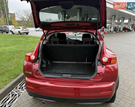 Червоний Ніссан Жук, об'ємом двигуна 1.6 л та пробігом 151 тис. км за 9900 $, фото 15 на Automoto.ua