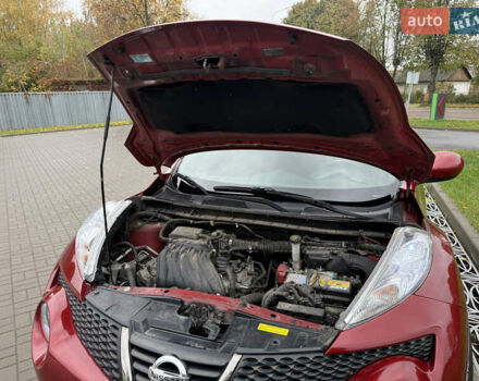 Червоний Ніссан Жук, об'ємом двигуна 1.6 л та пробігом 151 тис. км за 9900 $, фото 9 на Automoto.ua