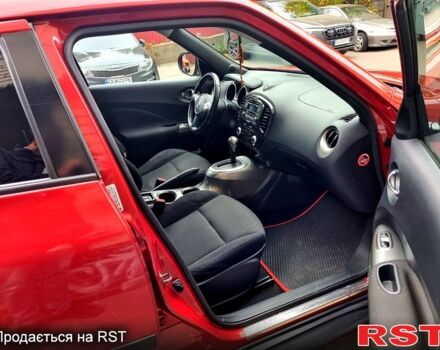Красный Ниссан Жук, объемом двигателя 1.6 л и пробегом 130 тыс. км за 10700 $, фото 13 на Automoto.ua