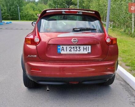 Червоний Ніссан Жук, об'ємом двигуна 1.6 л та пробігом 114 тис. км за 11000 $, фото 3 на Automoto.ua