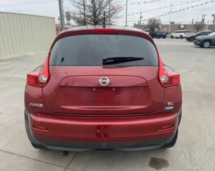 Червоний Ніссан Жук, об'ємом двигуна 1.6 л та пробігом 80 тис. км за 12600 $, фото 5 на Automoto.ua