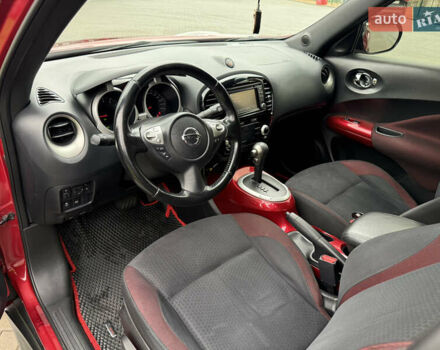 Червоний Ніссан Жук, об'ємом двигуна 1.6 л та пробігом 151 тис. км за 9900 $, фото 13 на Automoto.ua