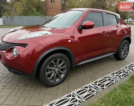 Червоний Ніссан Жук, об'ємом двигуна 1.6 л та пробігом 151 тис. км за 9900 $, фото 1 на Automoto.ua