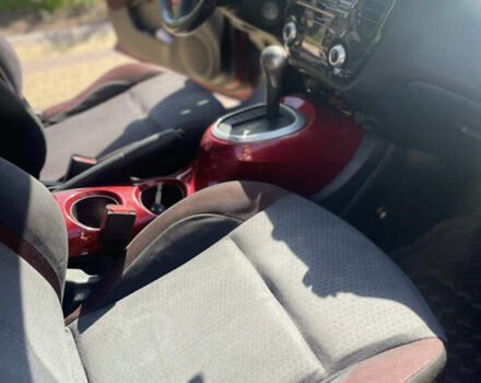 Красный Ниссан Жук, объемом двигателя 1.6 л и пробегом 147 тыс. км за 10700 $, фото 5 на Automoto.ua