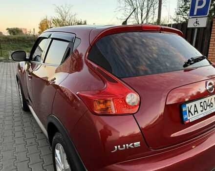 Червоний Ніссан Жук, об'ємом двигуна 1.6 л та пробігом 54 тис. км за 11800 $, фото 6 на Automoto.ua