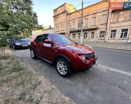 Червоний Ніссан Жук, об'ємом двигуна 1.6 л та пробігом 67 тис. км за 12300 $, фото 5 на Automoto.ua