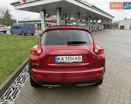 Червоний Ніссан Жук, об'ємом двигуна 1.6 л та пробігом 151 тис. км за 9900 $, фото 2 на Automoto.ua