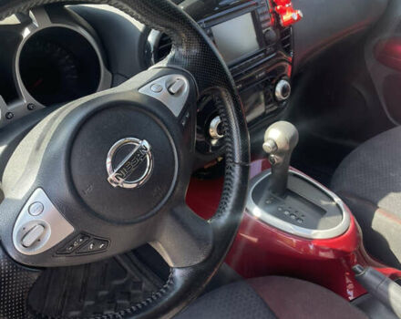 Красный Ниссан Жук, объемом двигателя 1.6 л и пробегом 147 тыс. км за 10700 $, фото 4 на Automoto.ua