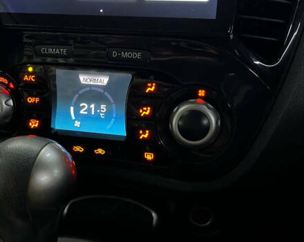 Червоний Ніссан Жук, об'ємом двигуна 1.6 л та пробігом 120 тис. км за 10000 $, фото 4 на Automoto.ua