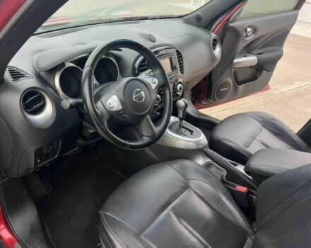 Червоний Ніссан Жук, об'ємом двигуна 1.6 л та пробігом 80 тис. км за 12600 $, фото 8 на Automoto.ua