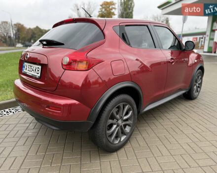 Червоний Ніссан Жук, об'ємом двигуна 1.6 л та пробігом 151 тис. км за 9900 $, фото 4 на Automoto.ua