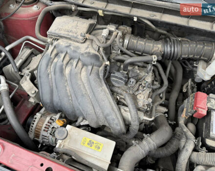 Червоний Ніссан Жук, об'ємом двигуна 1.6 л та пробігом 151 тис. км за 9900 $, фото 11 на Automoto.ua