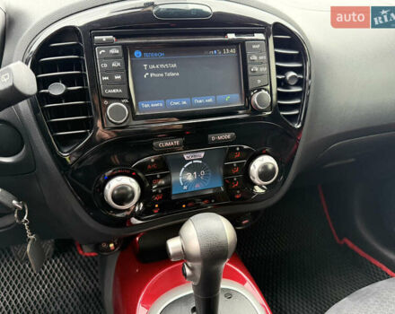 Червоний Ніссан Жук, об'ємом двигуна 1.6 л та пробігом 151 тис. км за 9900 $, фото 23 на Automoto.ua