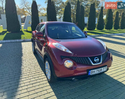 Красный Ниссан Жук, объемом двигателя 1.6 л и пробегом 169 тыс. км за 9800 $, фото 6 на Automoto.ua