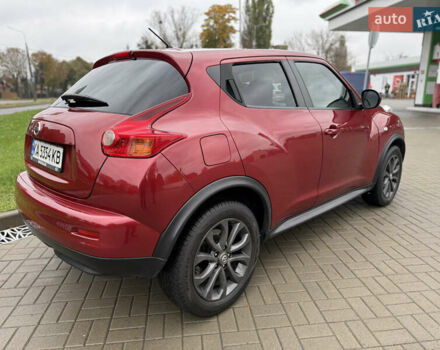 Червоний Ніссан Жук, об'ємом двигуна 1.6 л та пробігом 151 тис. км за 9900 $, фото 5 на Automoto.ua