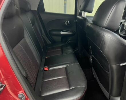 Червоний Ніссан Жук, об'ємом двигуна 1.6 л та пробігом 80 тис. км за 12600 $, фото 12 на Automoto.ua