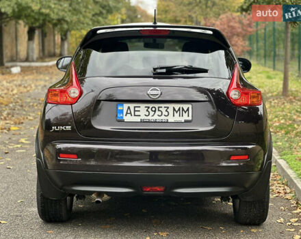 Ниссан Жук 2013 в Днепре (Днепропетровске) на Automoto.ua Красный Ниссан Жук, объемом двигателя 1.6 л и пробегом 116 тыс. км за 12000 $, фото 8 на Automoto.ua