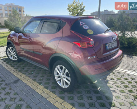 Червоний Ніссан Жук, об'ємом двигуна 1.6 л та пробігом 94 тис. км за 11500 $, фото 9 на Automoto.ua