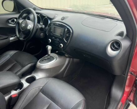 Червоний Ніссан Жук, об'ємом двигуна 1.6 л та пробігом 80 тис. км за 12600 $, фото 9 на Automoto.ua