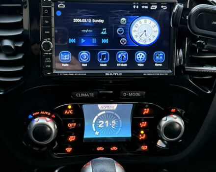 Червоний Ніссан Жук, об'ємом двигуна 1.6 л та пробігом 54 тис. км за 11800 $, фото 15 на Automoto.ua