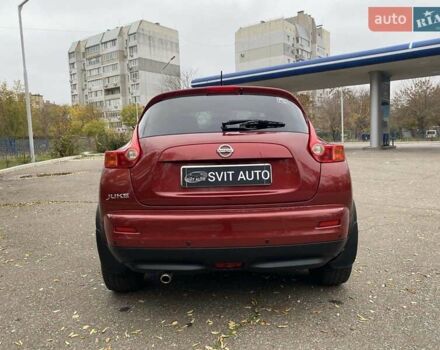 Красный Ниссан Жук, объемом двигателя 1.6 л и пробегом 56 тыс. км за 12200 $, фото 13 на Automoto.ua
