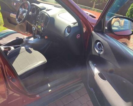 Червоний Ніссан Жук, об'ємом двигуна 1.6 л та пробігом 122 тис. км за 10200 $, фото 17 на Automoto.ua