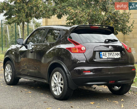 Ниссан Жук 2013 в Днепре (Днепропетровске) на Automoto.ua Красный Ниссан Жук, объемом двигателя 1.6 л и пробегом 116 тыс. км за 12000 $, фото 9 на Automoto.ua