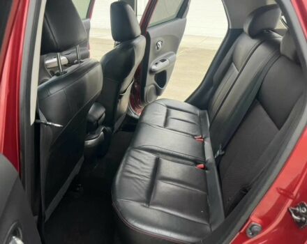 Червоний Ніссан Жук, об'ємом двигуна 1.6 л та пробігом 80 тис. км за 12600 $, фото 11 на Automoto.ua