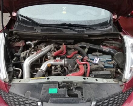 Красный Ниссан Жук, объемом двигателя 2 л и пробегом 126 тыс. км за 8900 $, фото 7 на Automoto.ua