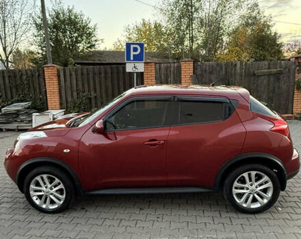 Червоний Ніссан Жук, об'ємом двигуна 1.6 л та пробігом 54 тис. км за 11800 $, фото 7 на Automoto.ua