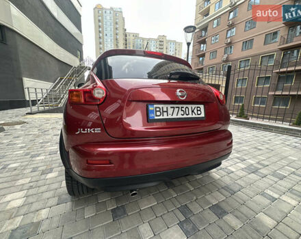 Красный Ниссан Жук, объемом двигателя 1.6 л и пробегом 102 тыс. км за 9200 $, фото 4 на Automoto.ua