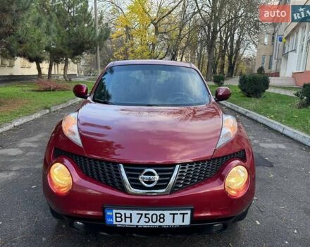 Красный Ниссан Жук, объемом двигателя 1.6 л и пробегом 170 тыс. км за 10300 $, фото 5 на Automoto.ua