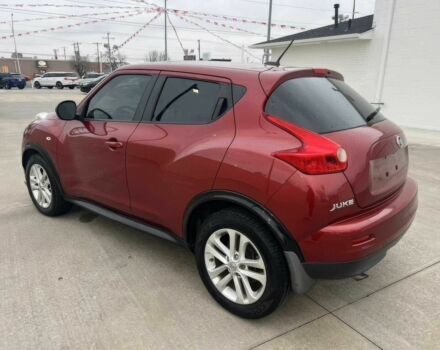 Червоний Ніссан Жук, об'ємом двигуна 1.6 л та пробігом 80 тис. км за 12600 $, фото 6 на Automoto.ua