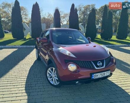 Красный Ниссан Жук, объемом двигателя 1.6 л и пробегом 170 тыс. км за 9700 $, фото 2 на Automoto.ua