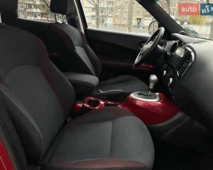 Червоний Ніссан Жук, об'ємом двигуна 1.62 л та пробігом 188 тис. км за 10500 $, фото 17 на Automoto.ua