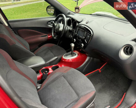 Червоний Ніссан Жук, об'ємом двигуна 1.6 л та пробігом 151 тис. км за 9900 $, фото 17 на Automoto.ua