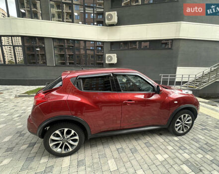 Червоний Ніссан Жук, об'ємом двигуна 1.6 л та пробігом 102 тис. км за 8950 $, фото 4 на Automoto.ua