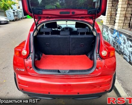 Красный Ниссан Жук, объемом двигателя 1.6 л и пробегом 130 тыс. км за 10700 $, фото 8 на Automoto.ua