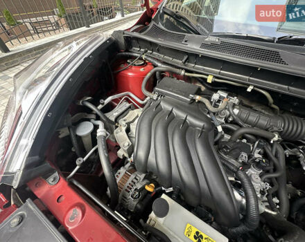 Червоний Ніссан Жук, об'ємом двигуна 1.6 л та пробігом 102 тис. км за 8950 $, фото 13 на Automoto.ua