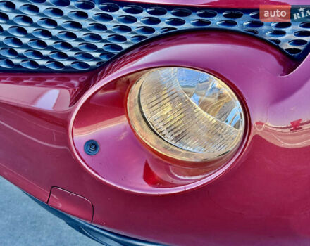 Красный Ниссан Жук, объемом двигателя 1.6 л и пробегом 54 тыс. км за 11500 $, фото 5 на Automoto.ua