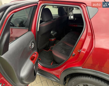 Червоний Ніссан Жук, об'ємом двигуна 1.6 л та пробігом 151 тис. км за 9900 $, фото 14 на Automoto.ua