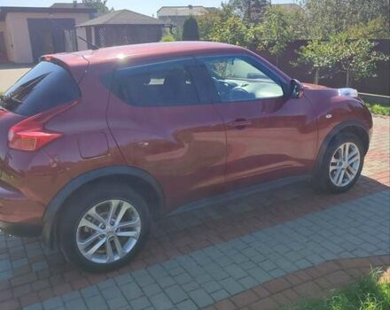 Червоний Ніссан Жук, об'ємом двигуна 1.6 л та пробігом 122 тис. км за 10200 $, фото 2 на Automoto.ua