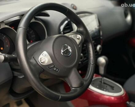 Красный Ниссан Жук, объемом двигателя 1.6 л и пробегом 188 тыс. км за 10500 $, фото 9 на Automoto.ua